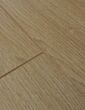 Close-up Of Beveled Edge Brown Laminate Floor
