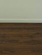 Chestnut wood floor with white wall